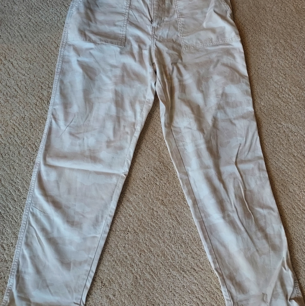 Women's capris size 12/31 they are a light color with camouflage print.